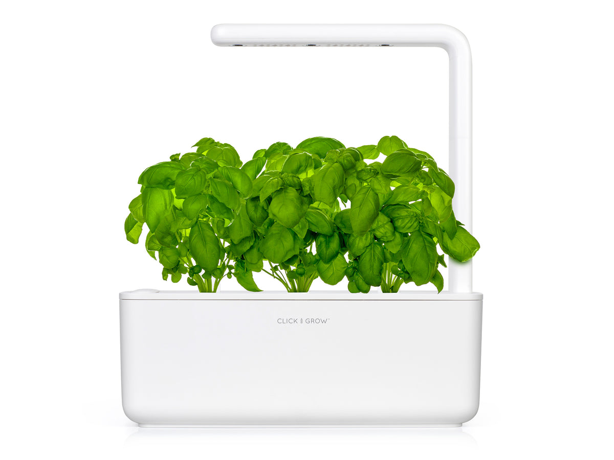 Grow herbs all year round with a smart indoor garden. Grow fresh basil, fresh cilantro and many more with the Click & Grow plant growing kit called the smart indoor garden. The best gift for plant lover!